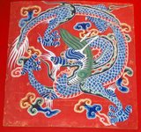 The dragon exists in Tibetan mythology either as a wood dragon or, more usually, in its more spectacular form as a thunder dragon. It is often portrayed in flight on Tibetan rugs and carpets with a depiction of stylized clouds. They are called brug or thunder dragons.