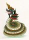 Nāga is the Sanskrit and Pāli word for a deity or class of entity or being, taking the form of a very great snake — specifically the king cobra, found in Hinduism and Buddhism. A female nāga is a nāgī or nāginī.<br/><br/>

Nats are spirits worshipped in Burma (or Myanmar) in conjunction with Buddhism. They are divided between the 37 Great Nats and all the rest (i.e., spirits of trees, water, etc.).